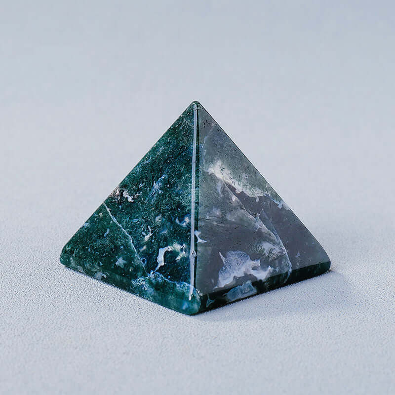 Elegant geometric crystal stone pyramid ornament for energy generation, meditation, and mindfulness practices.